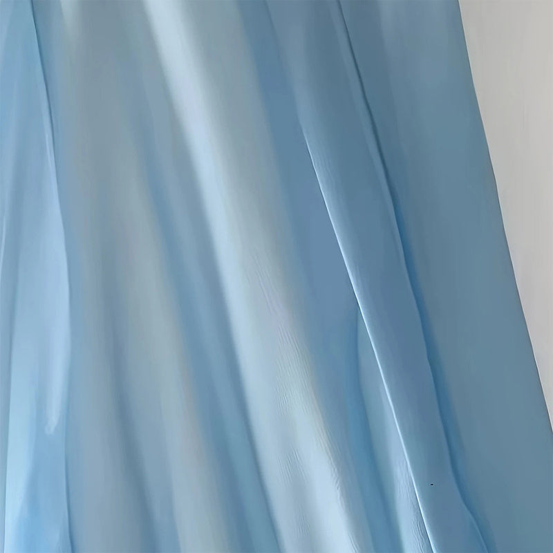 Light blue fabric with a plain background